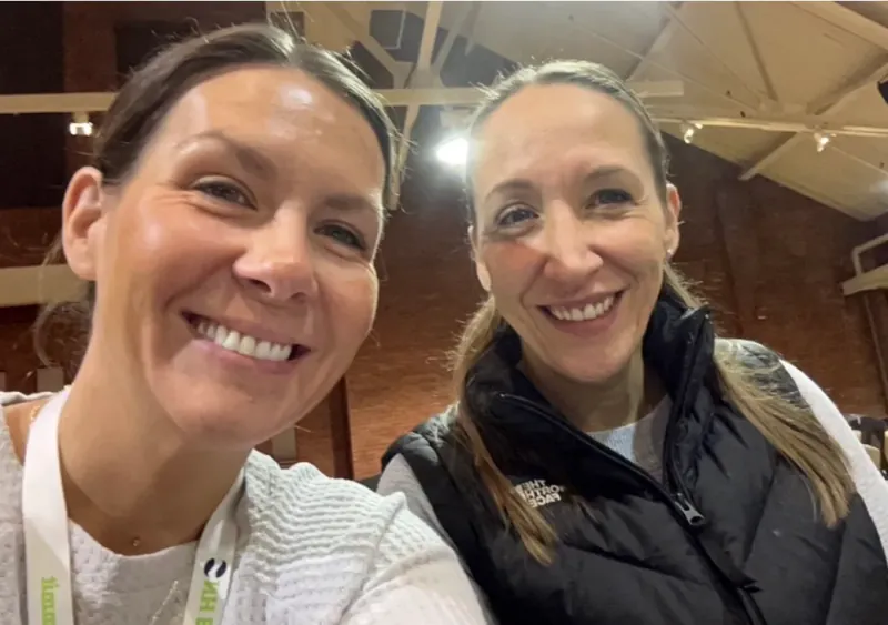 Denielle and Sarah at a conference in 2024