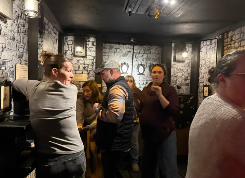 Chrysalis Recovery Center team during an escape room activity in 2025