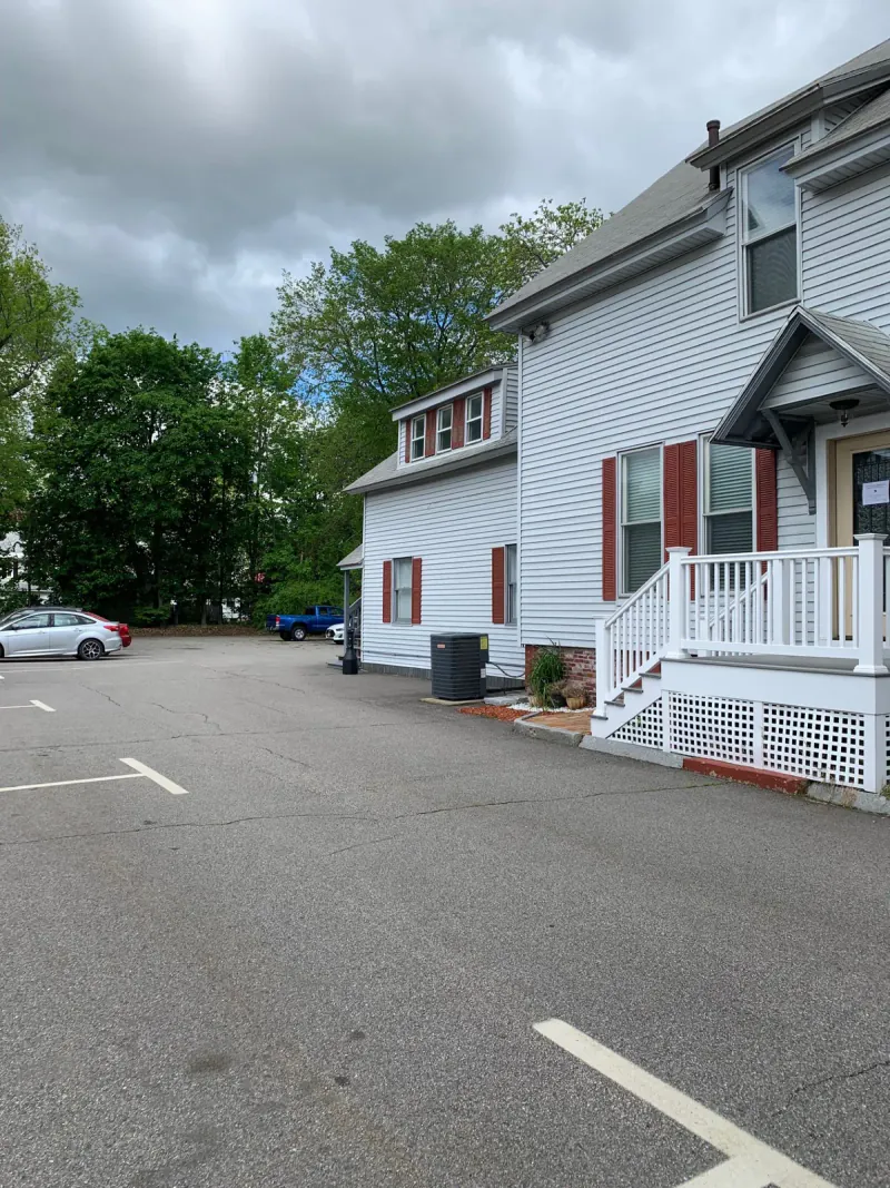 Rear parking lot and client entry door at the Chrysalis Recovery Center office