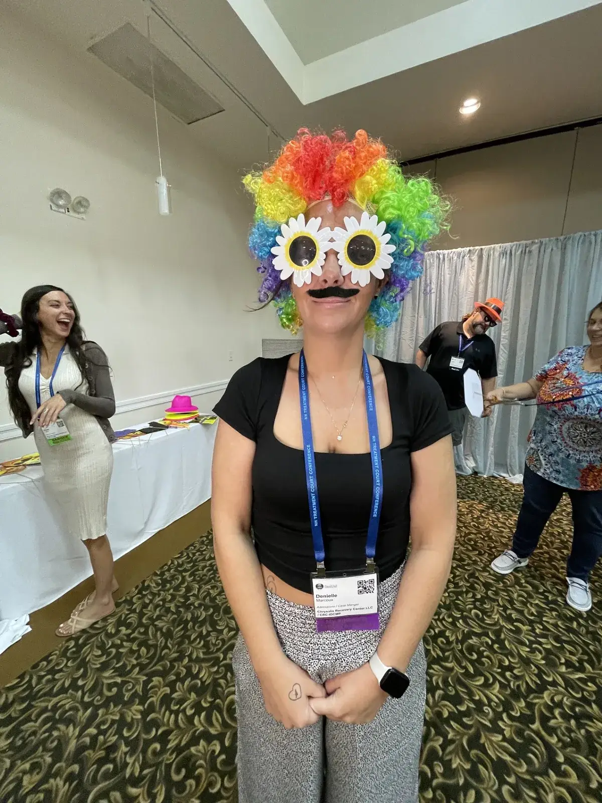 Chrysalis Recovery Center staff member making the team laugh at an office event
