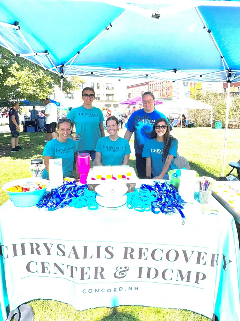 Chrysalis Recovery Center team at a recovery event in 2025